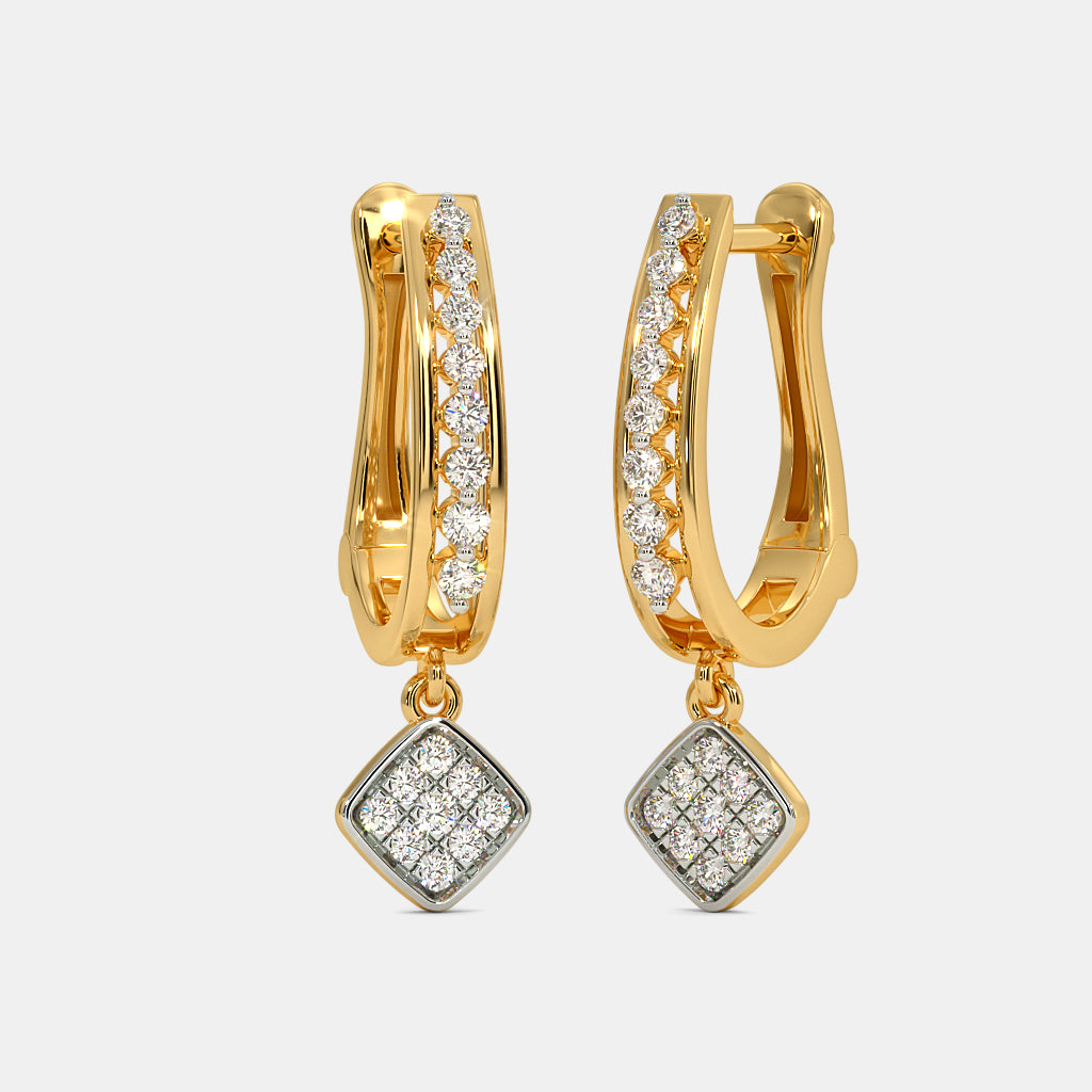 The Surahi Huggie Earrings