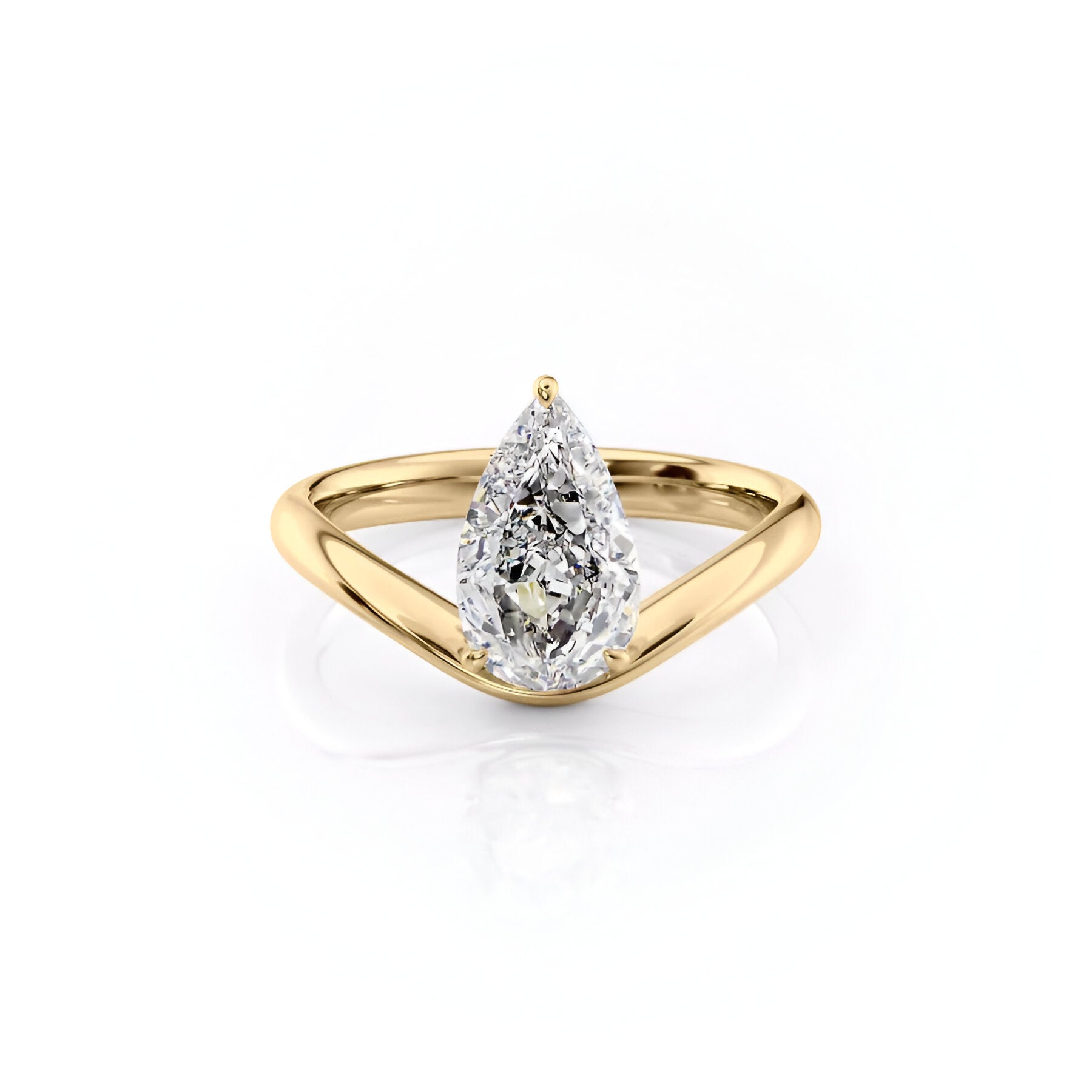 The Pear Brokline Wave Set Solitaire Diamond Ring